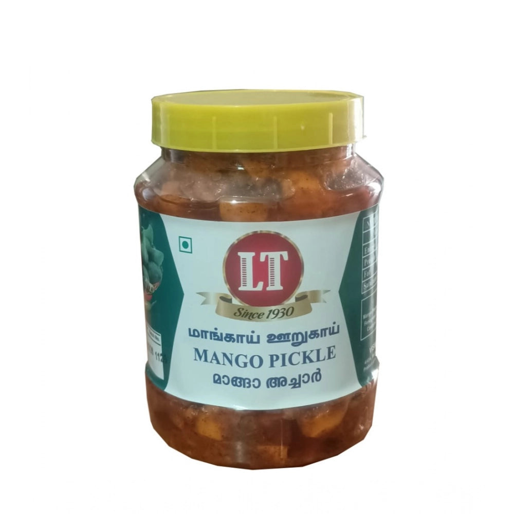 Mango pickle jar with green screw lid, dark brown pickle pieces and label