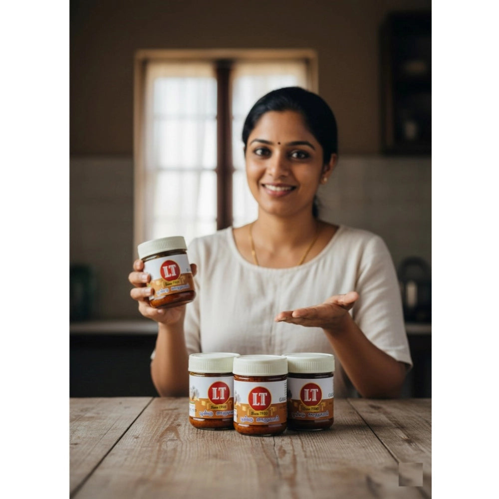 Red garlic pickle jar with white cap and LT label, with five jars in front