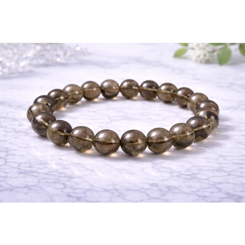 Amfyn Natural Crystal 8mm Smoky Quartz Bracelet (Brown)