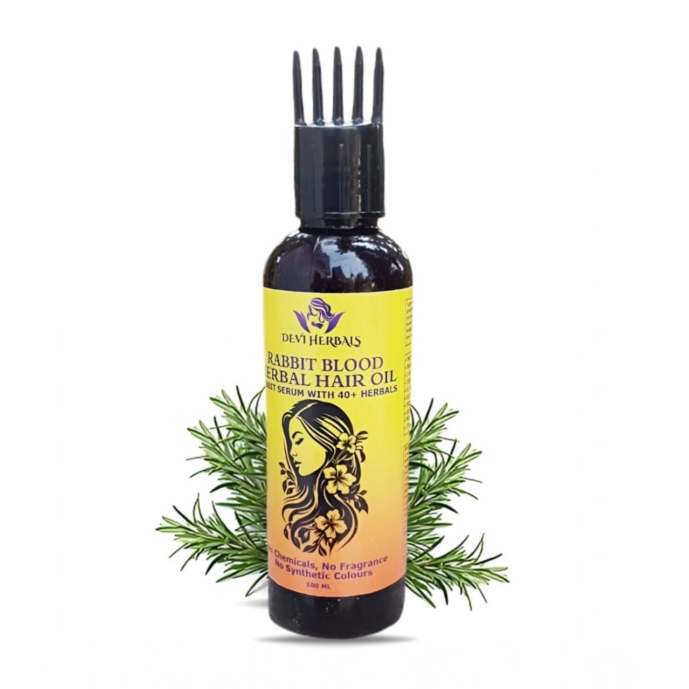 Rabbit blood herbal hair oil bottle with comb applicator and decorative green herbs