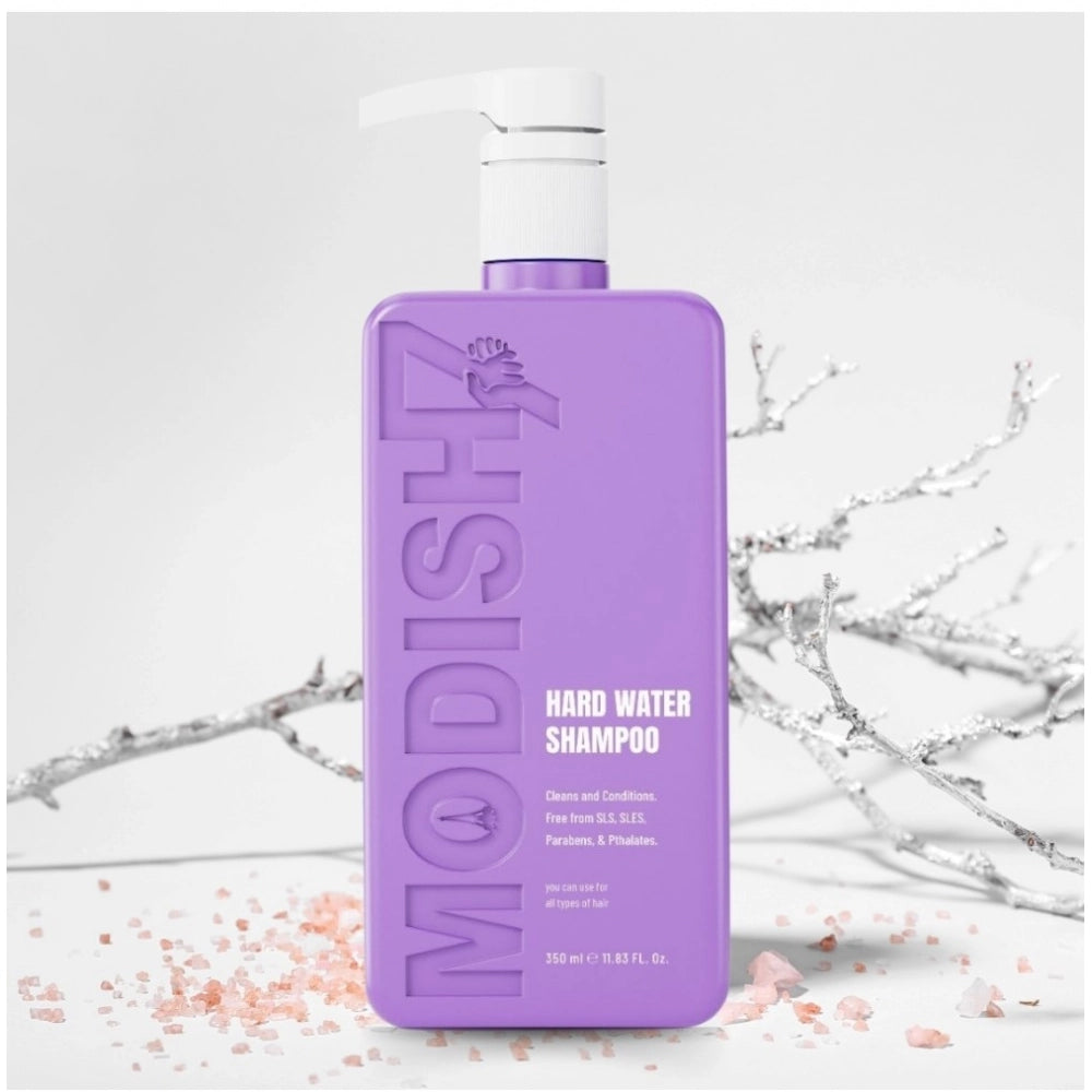 Purple hard water shampoo bottle with white pump, standing upright