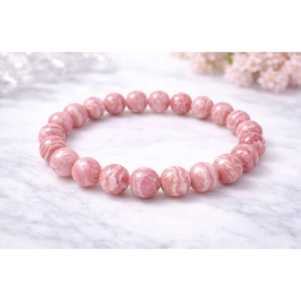Amfyn Natural Crystal 8mm Rhodochrosite Bracelet (Pink)