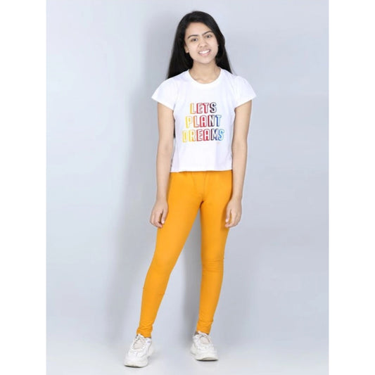Amfyn Girl's Cotton Lycra Solid Elasticated Jeggings (Mustard)