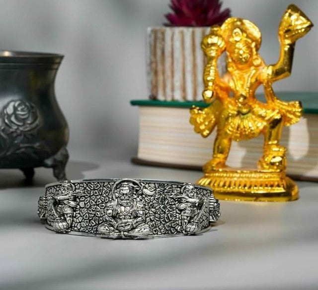 Silver-tone Hanumanji kada cuff bangle with textured pattern and central deity face