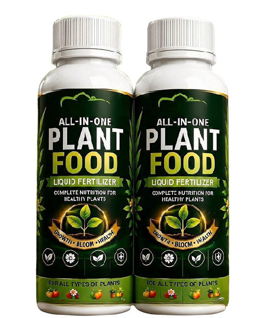 Pair of liquid plant food fertilizer bottles with white ribbed caps and green labels.